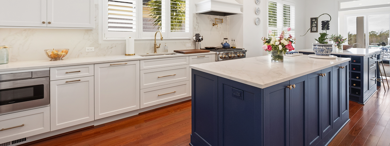Custom residential kitchen interior featuring hardwood flooring