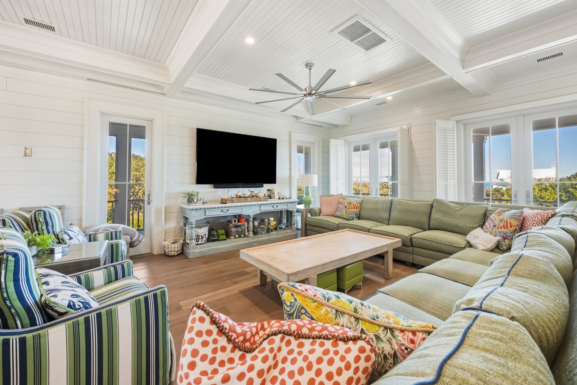 Custom residential living room with hardwood and area rug