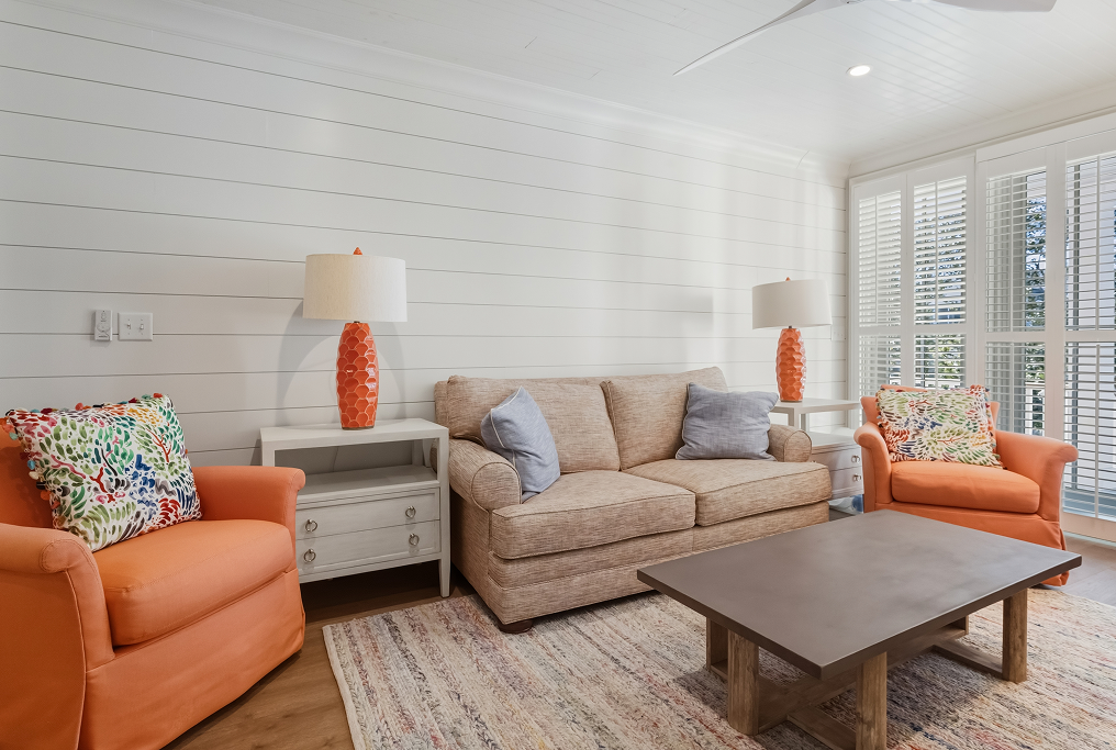 Empty interior with warm wood-tone flooring in a newly built home